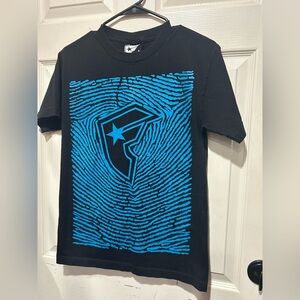 Y2K vintage Famous Stars & Straps t-shirt 2000s skate fashion. #Y2K #Skater.